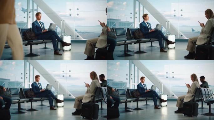 繁忙的机场航站楼: 英俊的商人在等待飞行时在笔记本电脑上工作。人们坐在大型航空枢纽的登机休息室中，飞