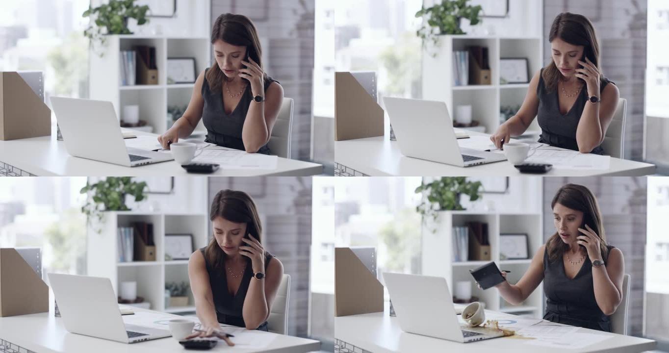 4k视频片段，一名年轻的女商人在办公室的笔记本电脑上洒咖啡