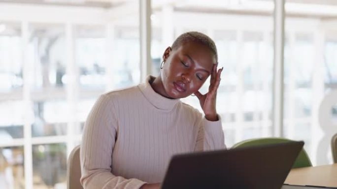 头痛，倦怠和黑人妇女在笔记本电脑上的办公室压力很大，需要报告，项目和截止日期。企业工作场所，心理健康