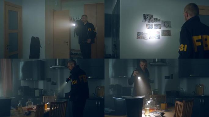 FBI探员在一间黑暗的公寓里拿着手电筒进入犯罪分子的巢穴
