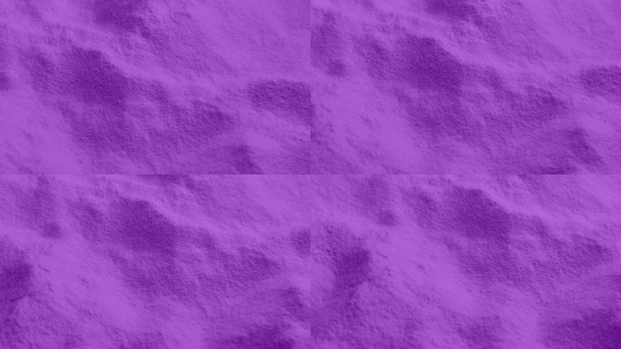 在细紫色粉末上方移动