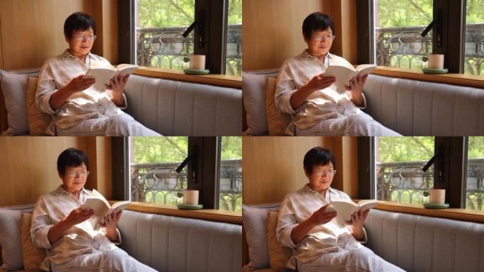 老年女性在家看书退休生活老有所乐老年人看
