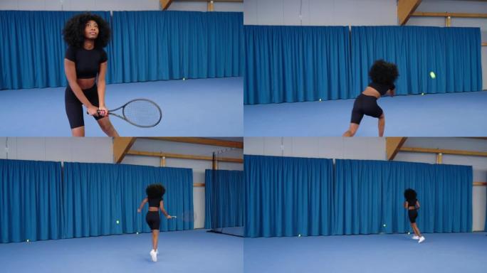 年轻的非洲女子在室内球场打网球