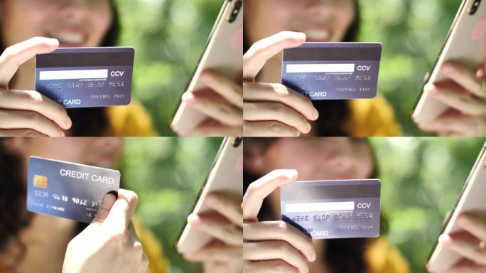 特写女人用信用卡在智能手机网上购物，网上购物概念