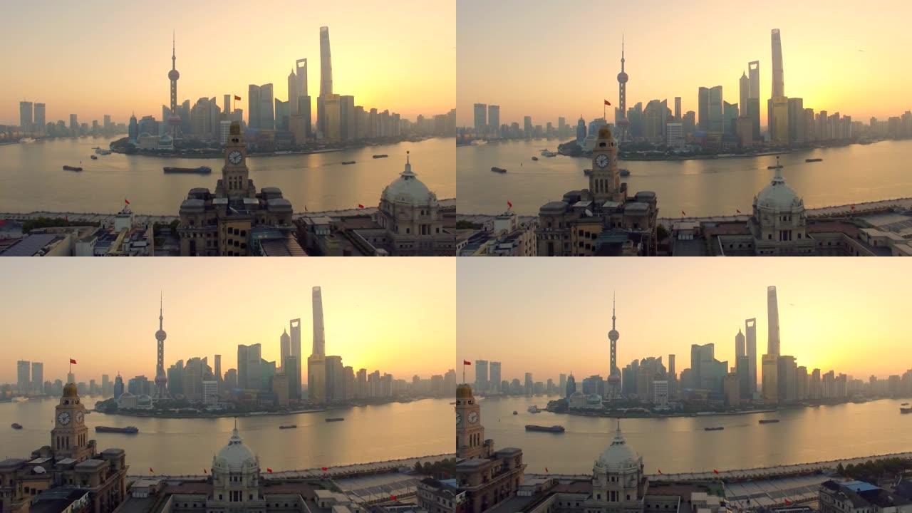 现代城市的日出上海陆家嘴电视塔明珠黄浦江