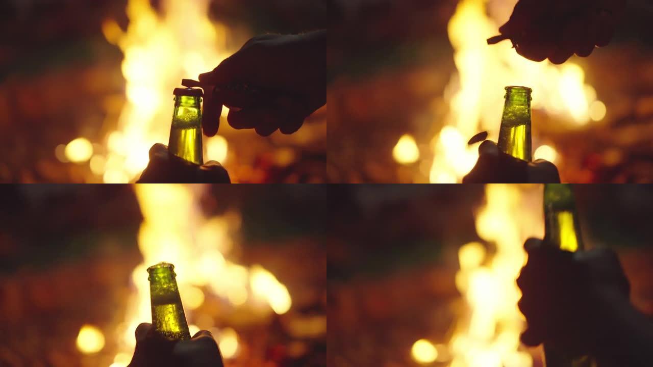 SLOMO POV在篝火前打开一瓶啤酒
