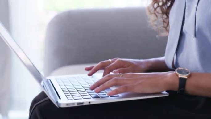 一名女商人在笔记本电脑上工作的4k视频片段
