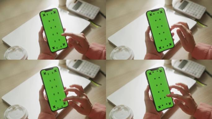 女人用手机绿屏绿屏扣屏操作