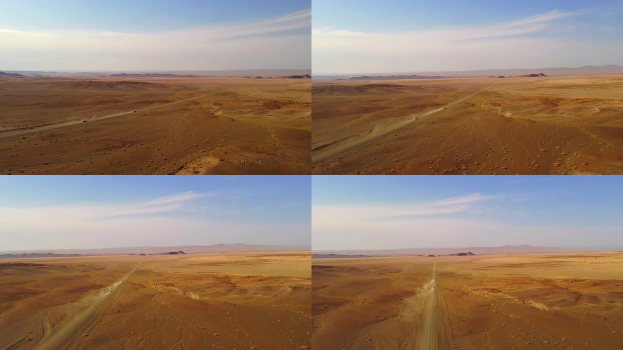 WS汽车在非洲纳米比亚广阔的偏远沙漠中行驶