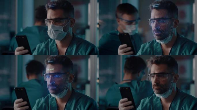 男性医生解锁带面部扫描的智能手机