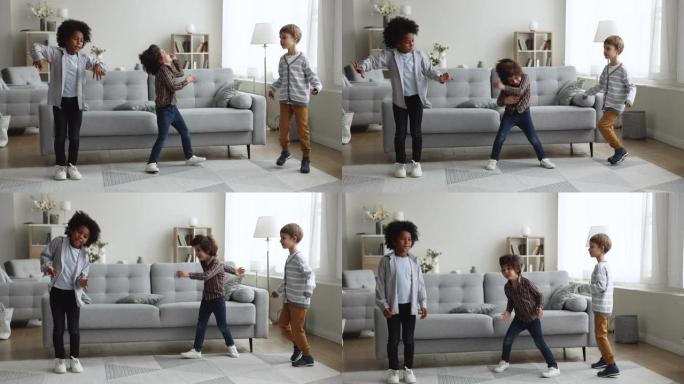 三个多民族的小男孩在客厅跳舞