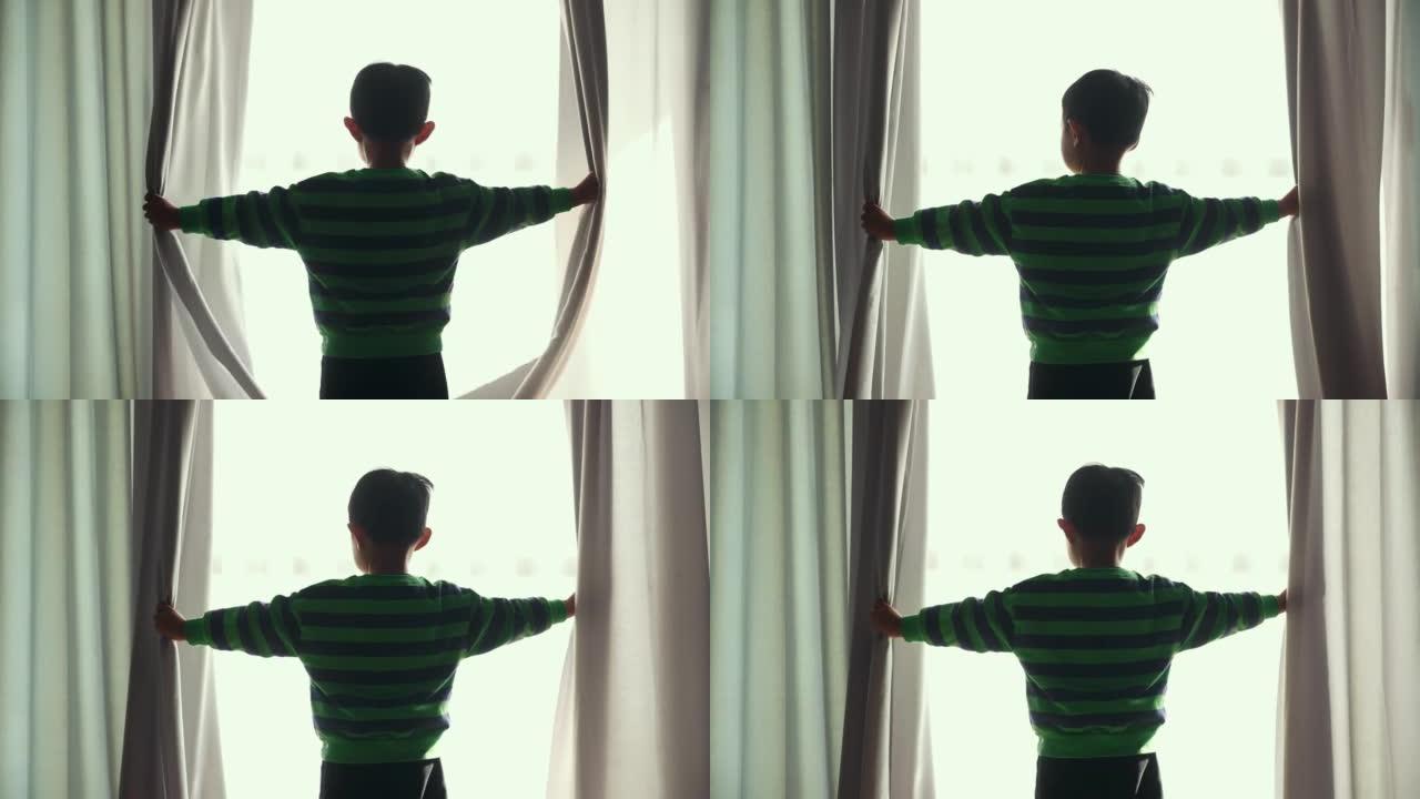 男孩打开窗帘儿童拉开窗帘打开窗帘窗外景色