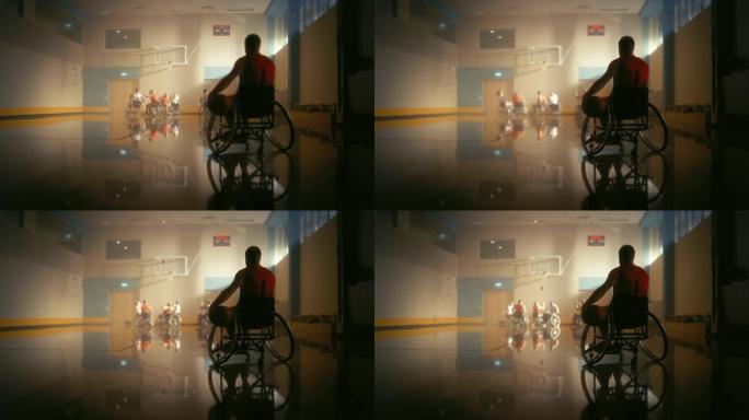 轮椅篮球比赛: 穿着红色衬衫的球员持球等待轮到他。运动员观看他的团队比赛。在这项运动中表现出色的残疾