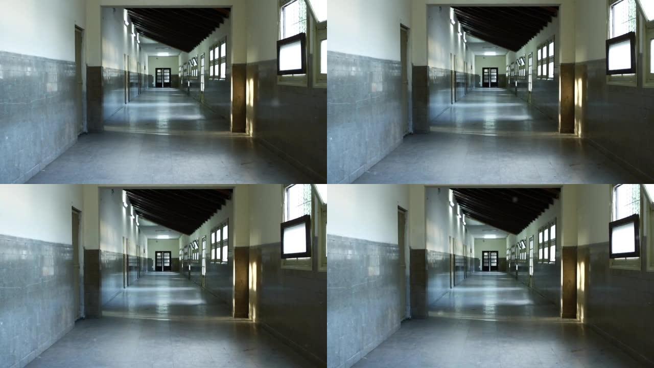 空荡荡的学校走廊，阿根廷布宜诺斯艾利斯一所公立学校的空荡荡的走廊。放大。