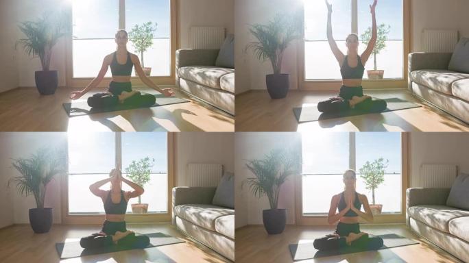 身体活跃，在家客厅练习瑜伽