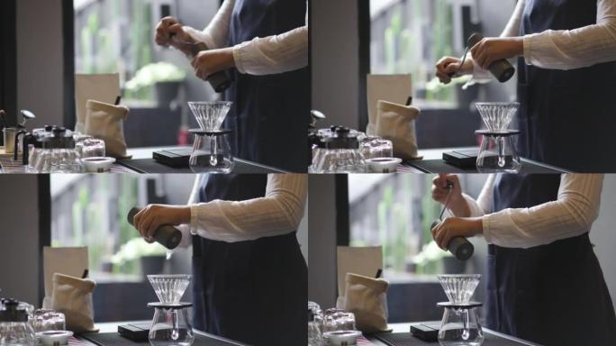 咖啡师用倒入热水制作咖啡滴水moka壶用老式设备冲泡咖啡滴水