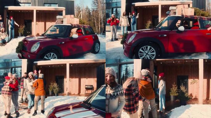 快乐开朗的多民族朋友开车去阳光明媚的雪冬屋聚会，庆祝圣诞节慢动作。