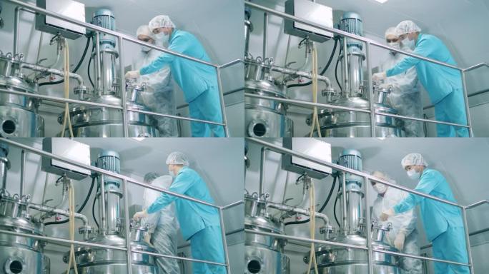 发酵反应器正由男性医学专家处理