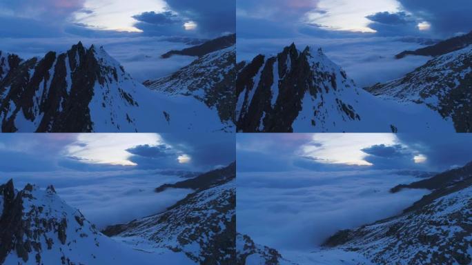 日落雪山与云海景观