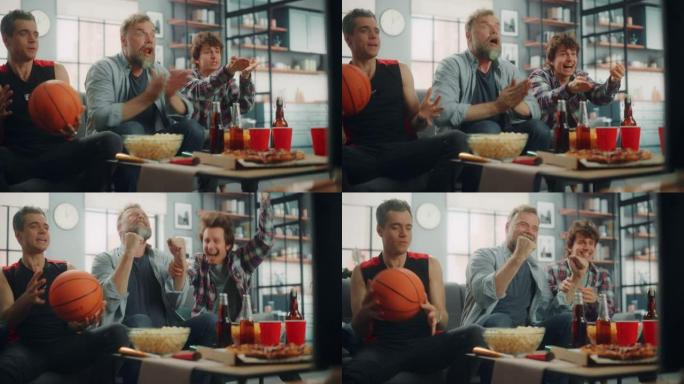 在家里，三个快乐的篮球迷坐在电视上的沙发上观看比赛，庆祝得分，运动队冠军的胜利。一群朋友为最喜欢的俱