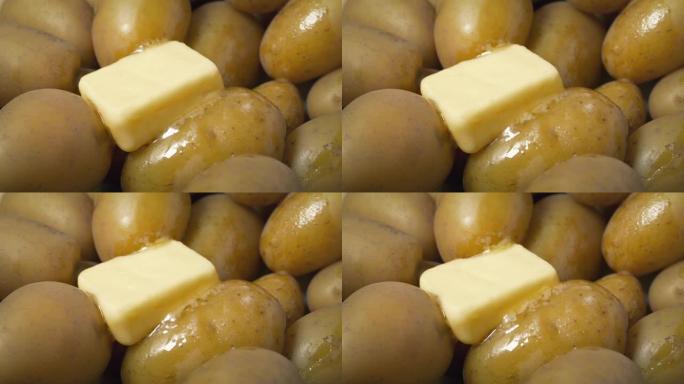 黄油在热土豆上融化，烹饪餐厅