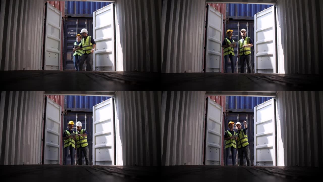 港口工人打开货运集装箱