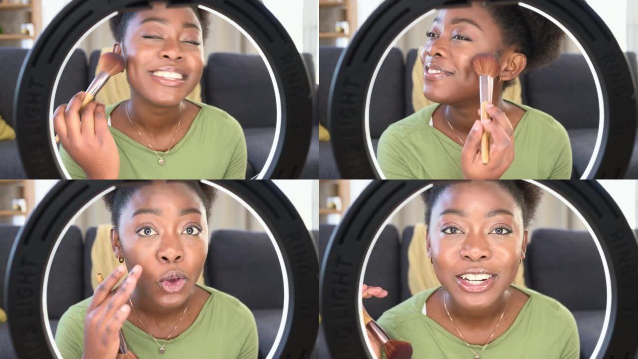 美容影响者为在线vlog频道拍摄带有环形灯的在家化妆教程。年轻的女性博客作者在社交媒体上直播并为追随