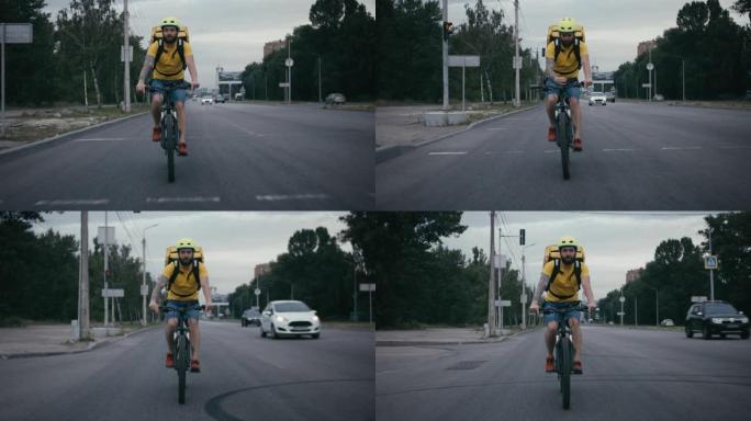 自行车信使在公路上骑自行车