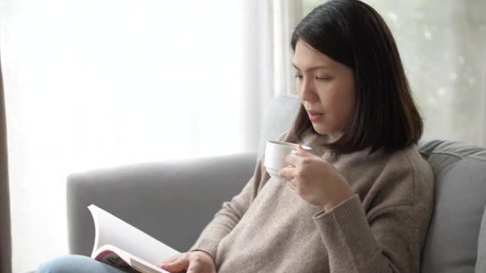 女人在家客厅看书女人在家客厅看书读书咖啡
