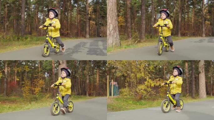 公园里骑平衡自行车的孩子