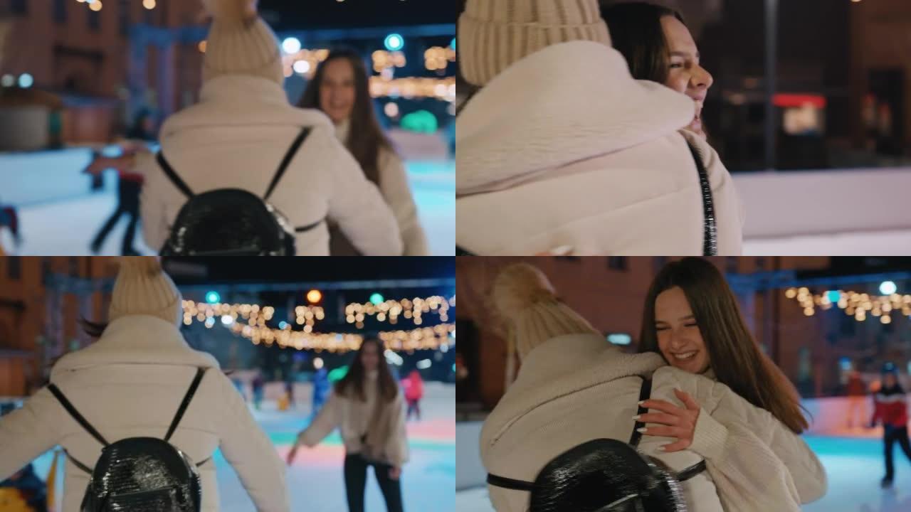 两个开朗的年轻女子在溜冰场上滑冰时拥抱