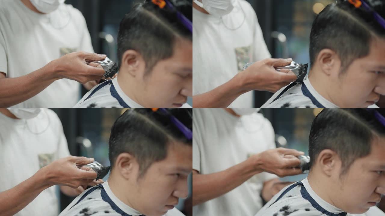 理发店复古时尚发型英俊亚洲男人顾客。