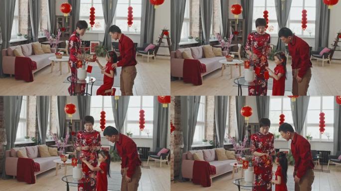 春节亚洲家庭装饰中国文化一家三口过年装饰