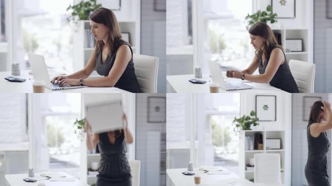 一名年轻女商人在工作时愤怒地将笔记本电脑扔在办公室的4k视频片段