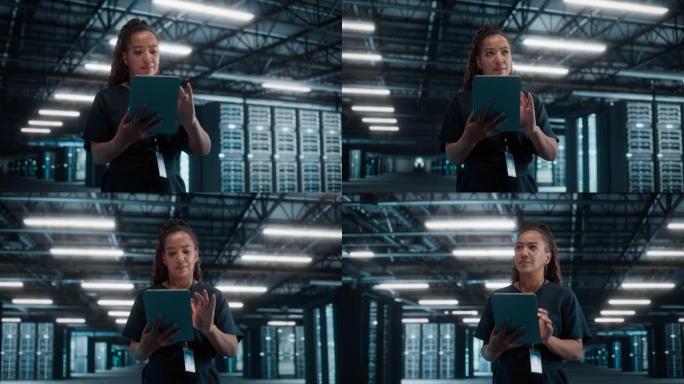 非裔美国女性IT专家使用笔记本电脑，站在大仓库数据中心。使用SAAS、云Web服务的系统管理员。电子