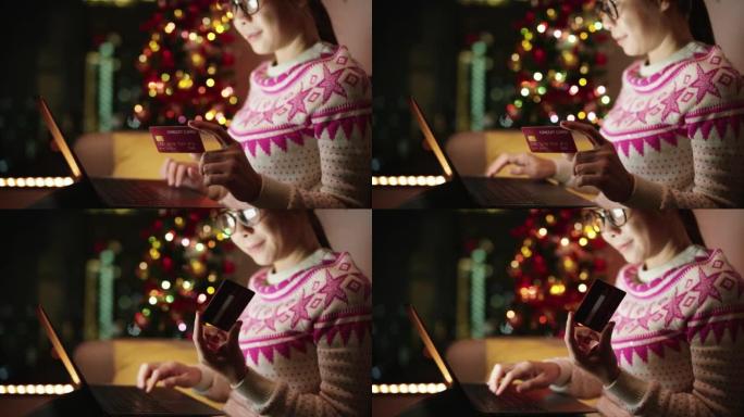 女人在圣诞节使用智能手机和卡片在线购买
