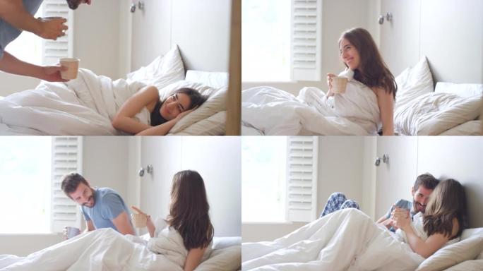 一个年轻人带女友咖啡躺在床上的4k视频片段