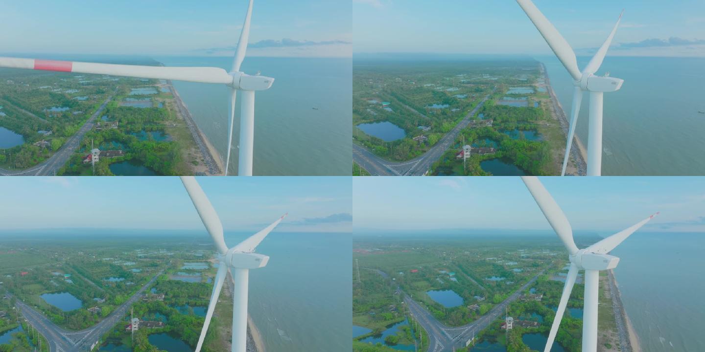 鸟瞰图蓝色阳光明媚的天空中用于能源生产的风力涡轮机领域