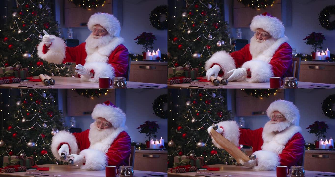 圣诞老人坐在餐桌旁现代公寓的客厅里。他拿起他的魔术卷轴，读他应该送礼物的孩子的名字。