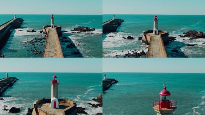 灯塔Felgueirasin波尔图的无人驾驶飞机视图，有海浪和城市景观，阳光明媚的日子
