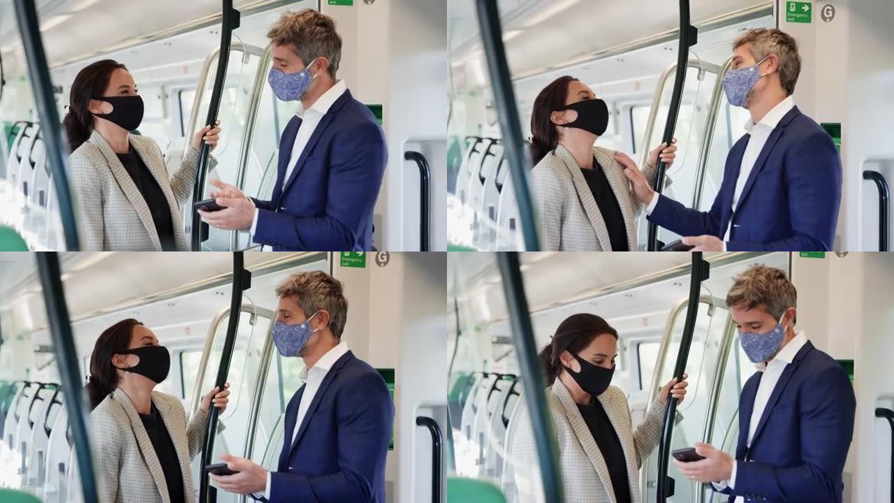 在大流行期间，商务通勤者站在火车车厢中，戴着PPE口罩的手机