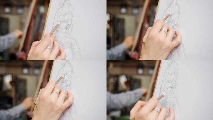 美术课上用铅笔在纸上的女性手绘肖像特写