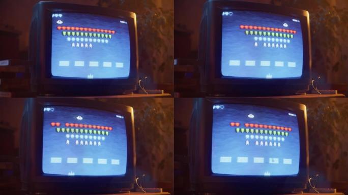带有8位2D 80年代灵感的游戏机街机视频游戏的复古电视机屏幕的特写镜头。怀旧的太空射击游戏，玩家与