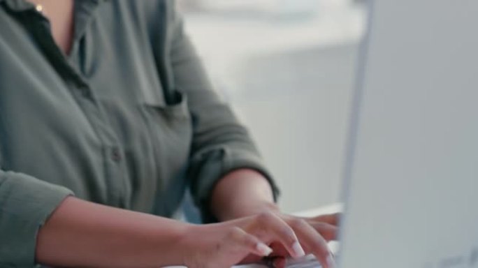 一名年轻女商人在她的电脑上打字的4k视频片段
