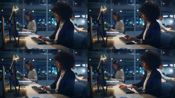 晚上在大公司办公室: 非裔美国女经理的肖像使用计算机，商人和围绕她工作的专家，分析统计数据，商业数据