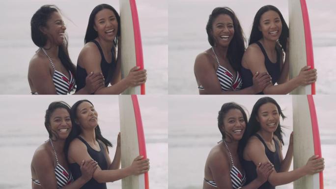 4k视频片段，两个年轻朋友站在一起，在海滩上度过一天