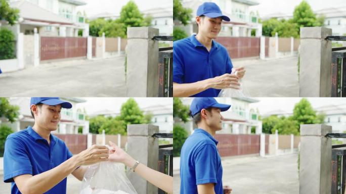 年轻的亚洲邮政快递快递员穿着蓝色衬衫处理食品盒，在家中发送给顾客，亚洲女性在户外接收包裹。