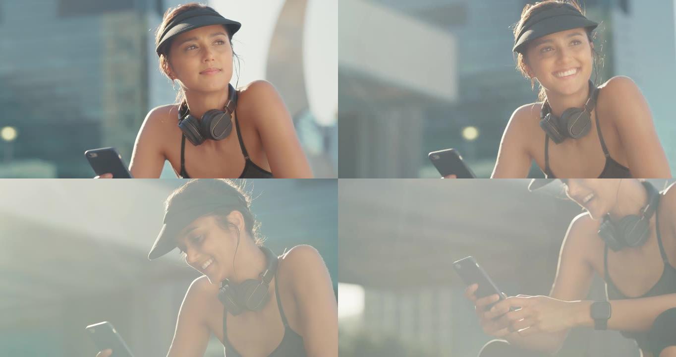 4k视频片段，一名运动的年轻女子坐在手机外面