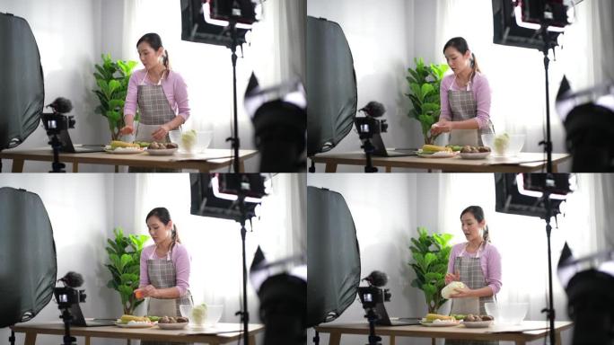 记录烹饪的女性视频记录器
