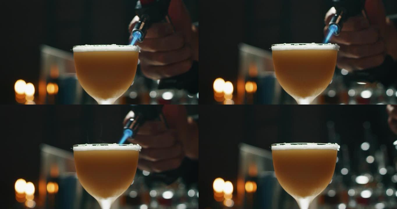 专业调酒师的特写镜头正在为酒吧或迪斯科舞厅的顾客准备含冰块的酒精鸡尾酒。